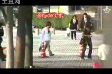 Hyde walks in the crowd of fans