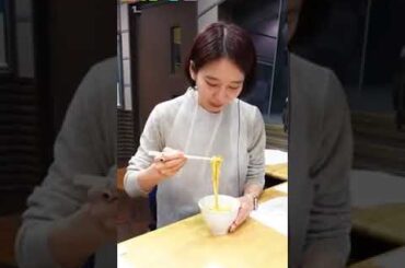 Japanese cute actress sipping udon