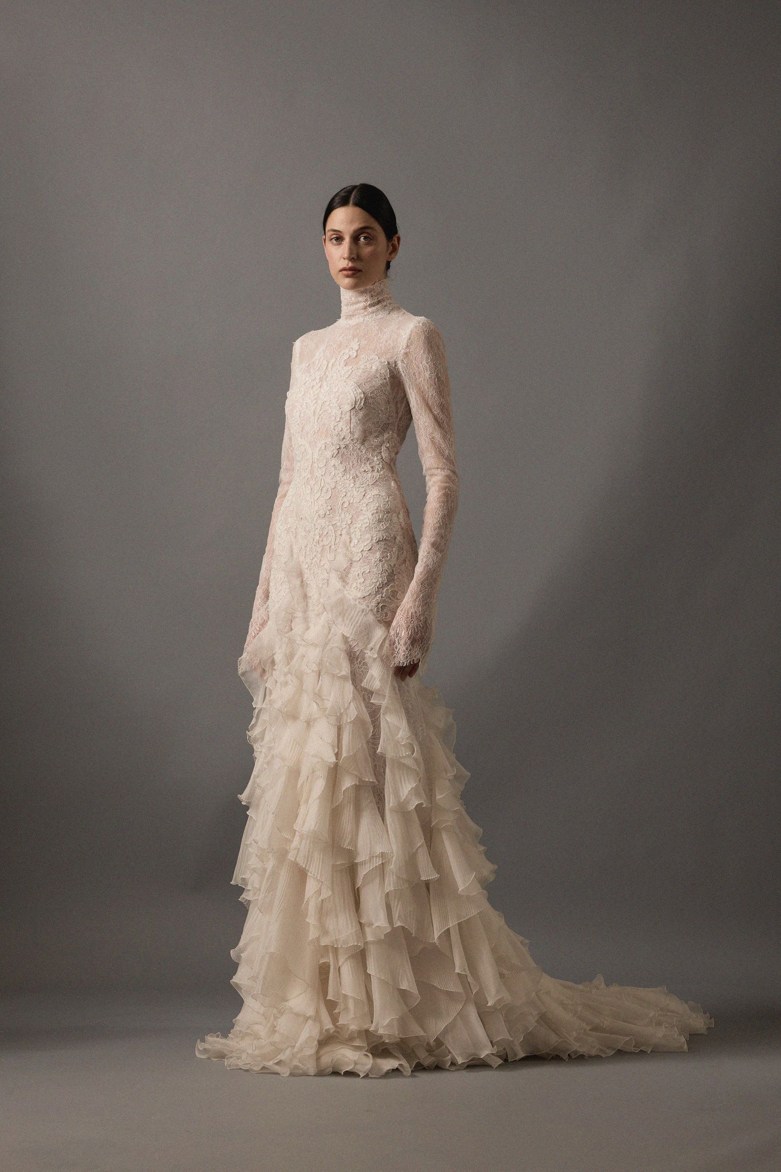 Image may contain Clothing Dress Fashion Formal Wear Gown Wedding Wedding Gown Adult and Person