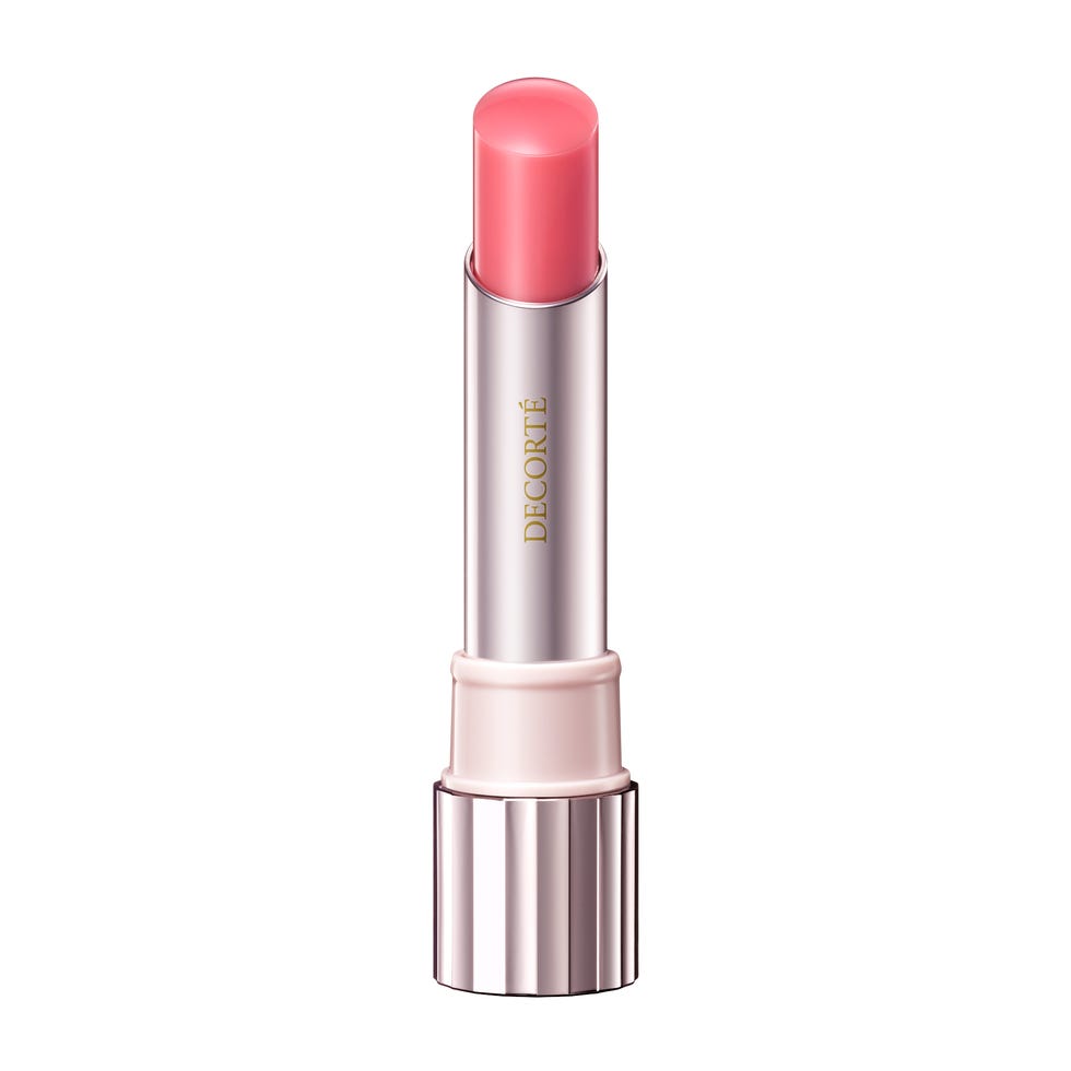 lipstick in a tube with a soft pink hue