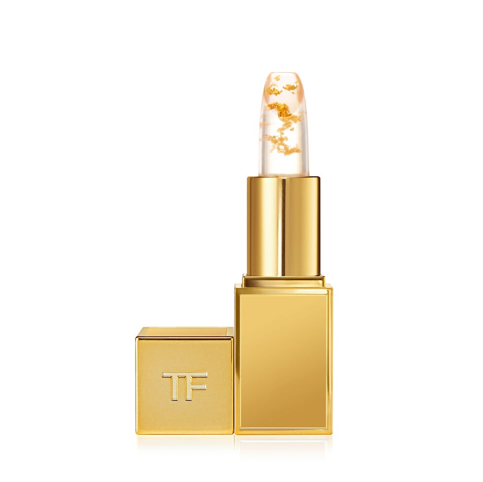 lipstick with gold flakes in elegant packaging