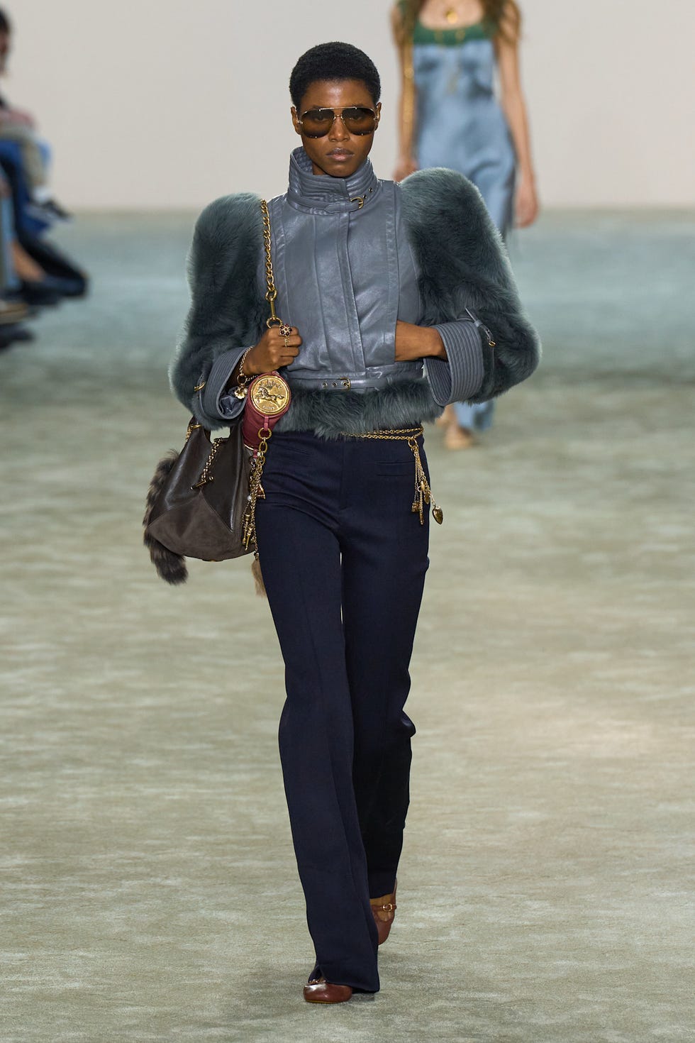 fashion model showcasing a stylish outfit on the runway