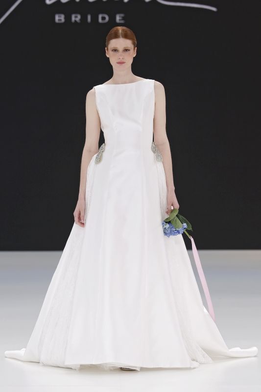 Image may contain Lisa Batiashvili Clothing Dress Fashion Formal Wear Gown Wedding Wedding Gown Adult and Person