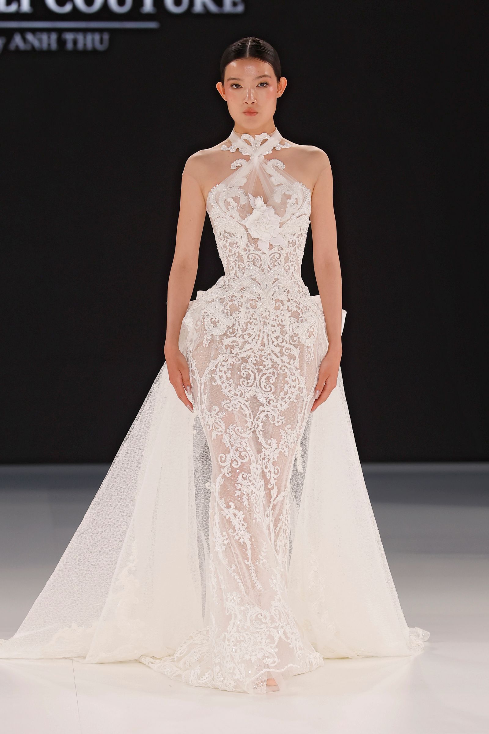 Image may contain Zhang Changning Clothing Dress Fashion Formal Wear Gown Wedding Wedding Gown Adult and Person