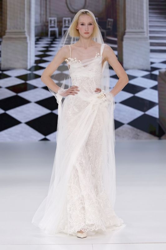 Image may contain Jade Parfitt Clothing Dress Fashion Formal Wear Gown Wedding Wedding Gown Adult and Person