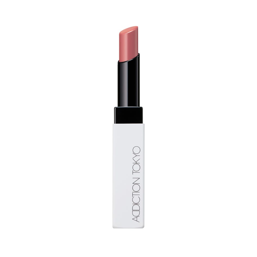 cosmetic lip product with a soft pink hue