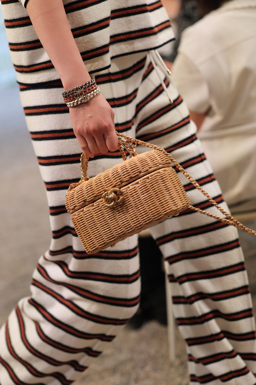 como, italy april 29: a model, bags detail, walks the runway at the chanel cruise 2025 fashion show at villa deste on april 29, 2025 in como, italy. (photo by jacopo raule/getty images)