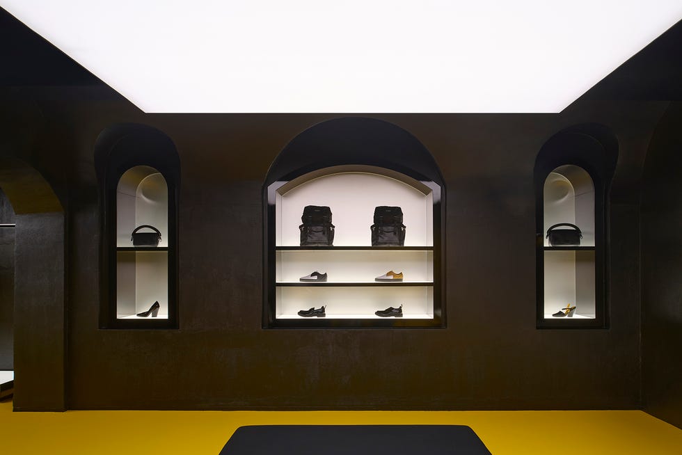 modern retail display featuring footwear and bags