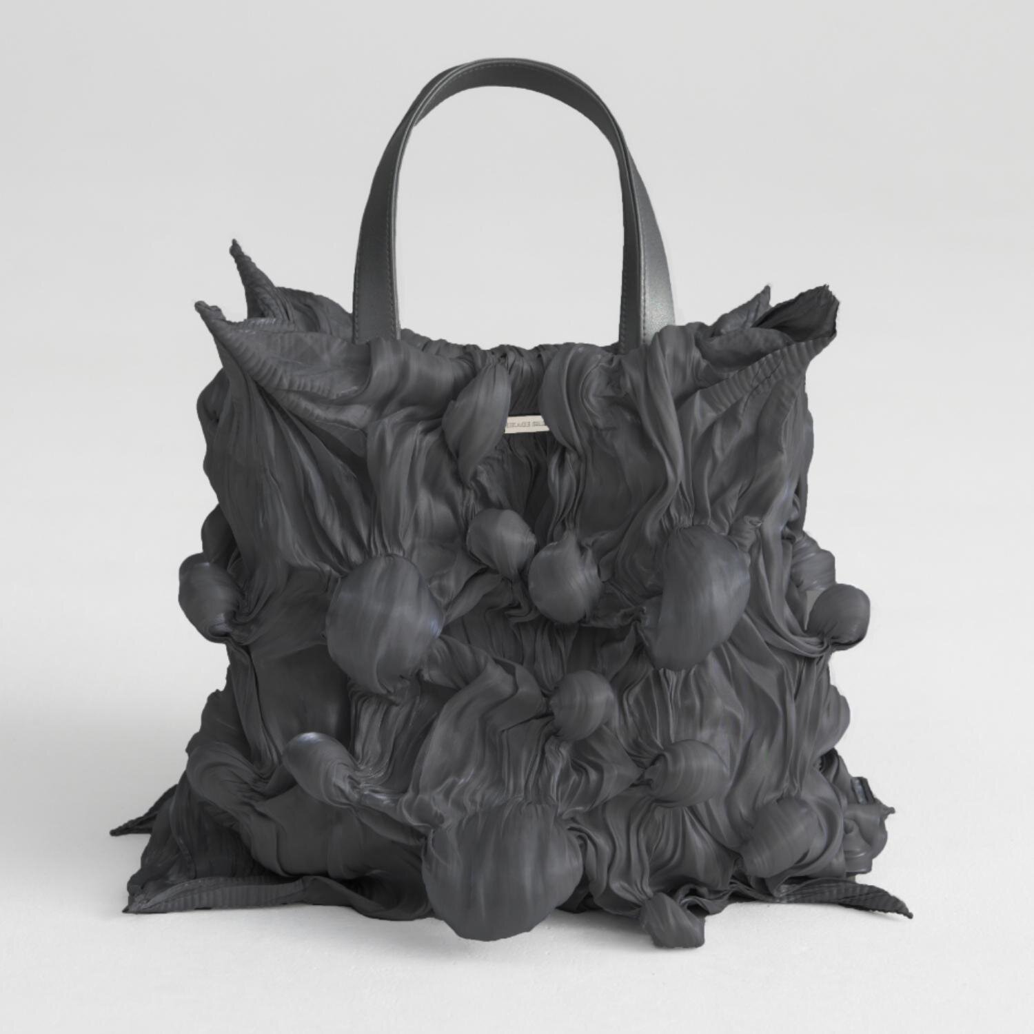 「スキッピー シボリ リキッド バッグ」68,200円