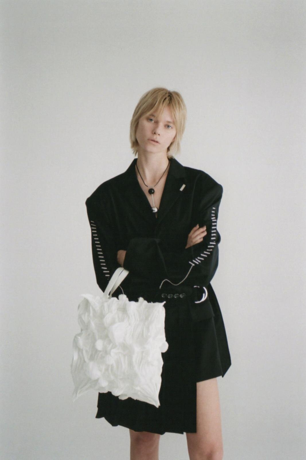 「スキッピー シボリ リキッド バッグ」68,200円