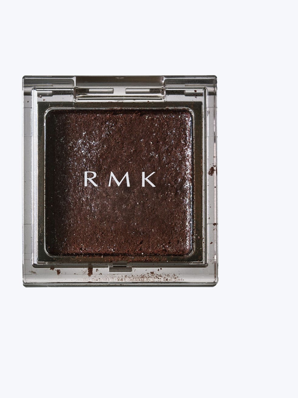 brown cosmetic powder in a clear compact