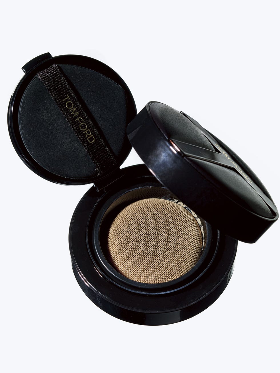 compact makeup with a mesh applicator