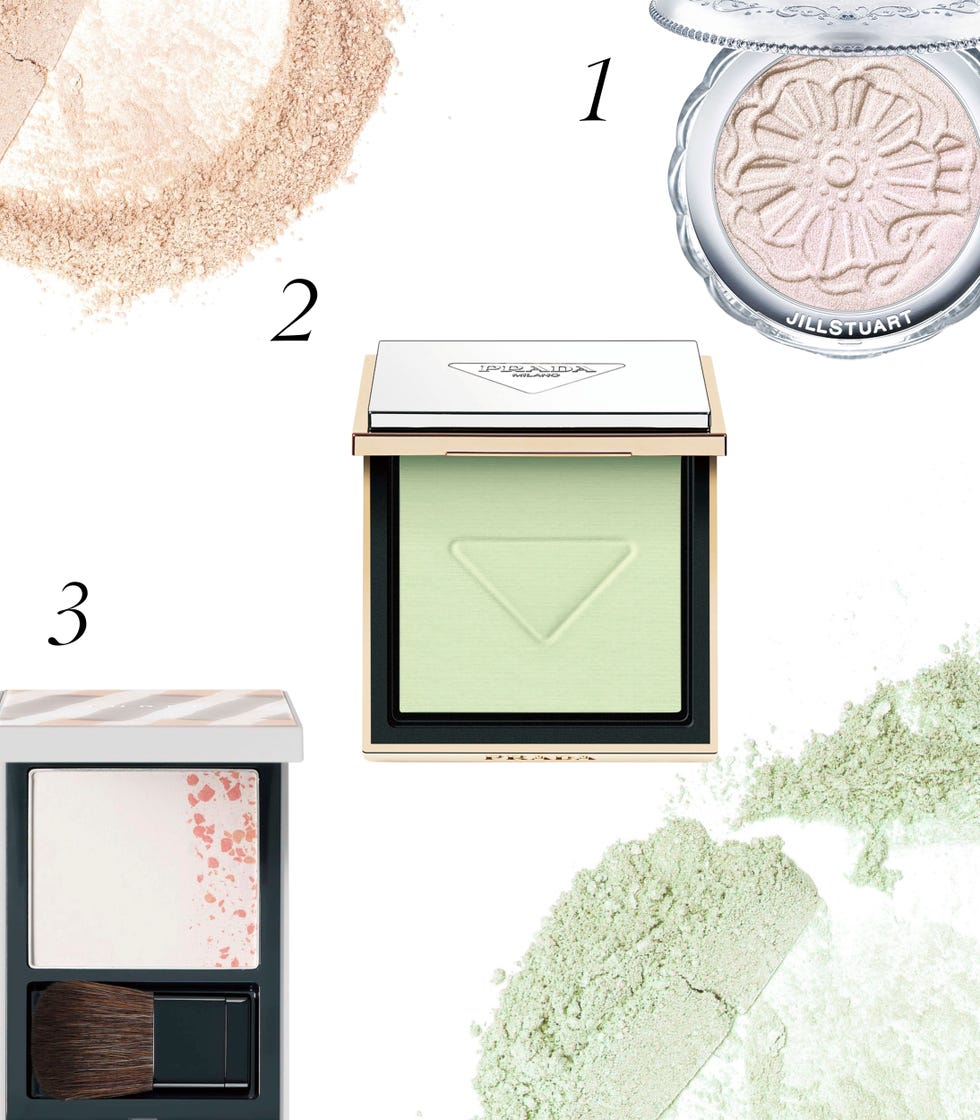 cosmetics products with various powders and a brush