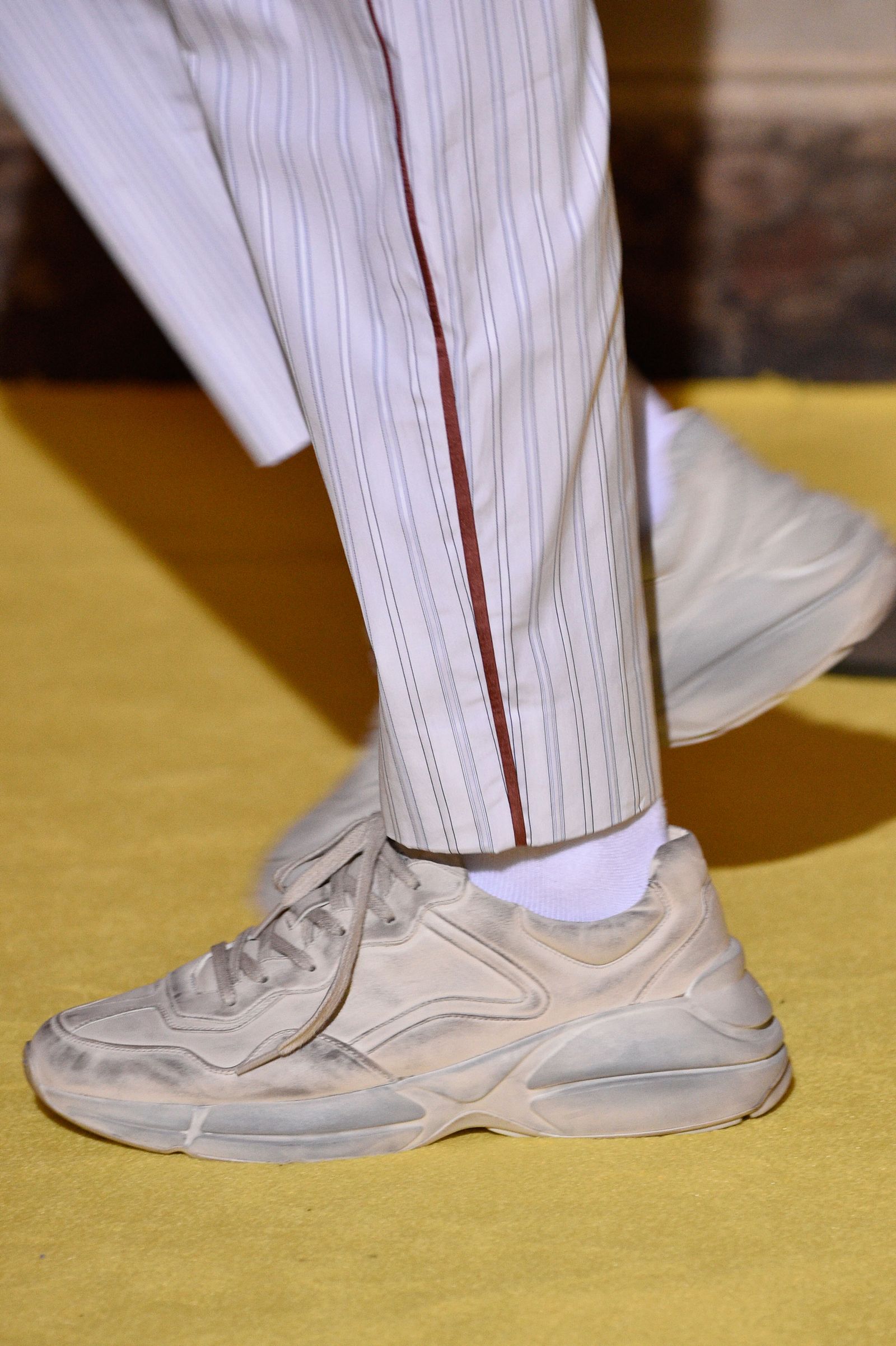 A scuffed sneaker from the Gucci Resort 2018 runway.