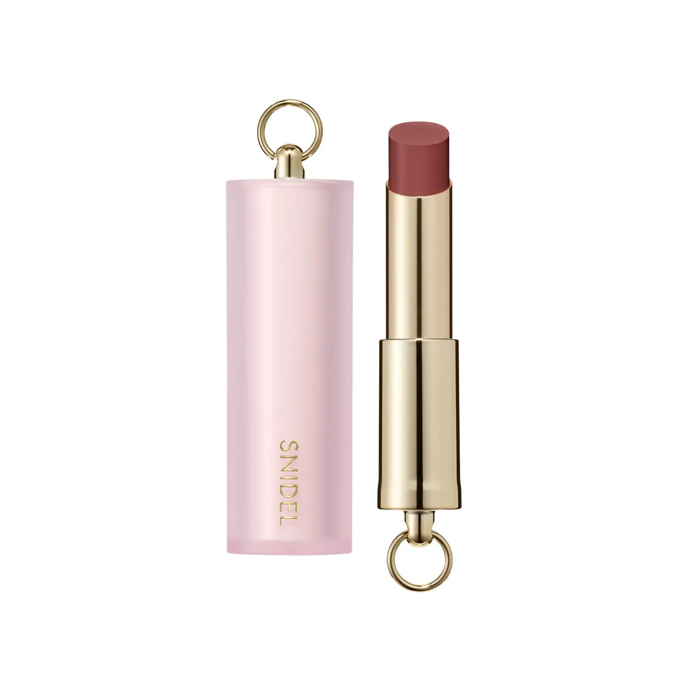 森香澄が魅せる【可憐&クール】な新境地!SNIDEL BEAUTY特設ページ「Soft Glow, Sharp Gaze」本日公開でファン必見! 8 ピンク色のリップスティックの製品写真です。リップスティックは、ピンク色のケースと金色のリップスティック本体で構成されています。