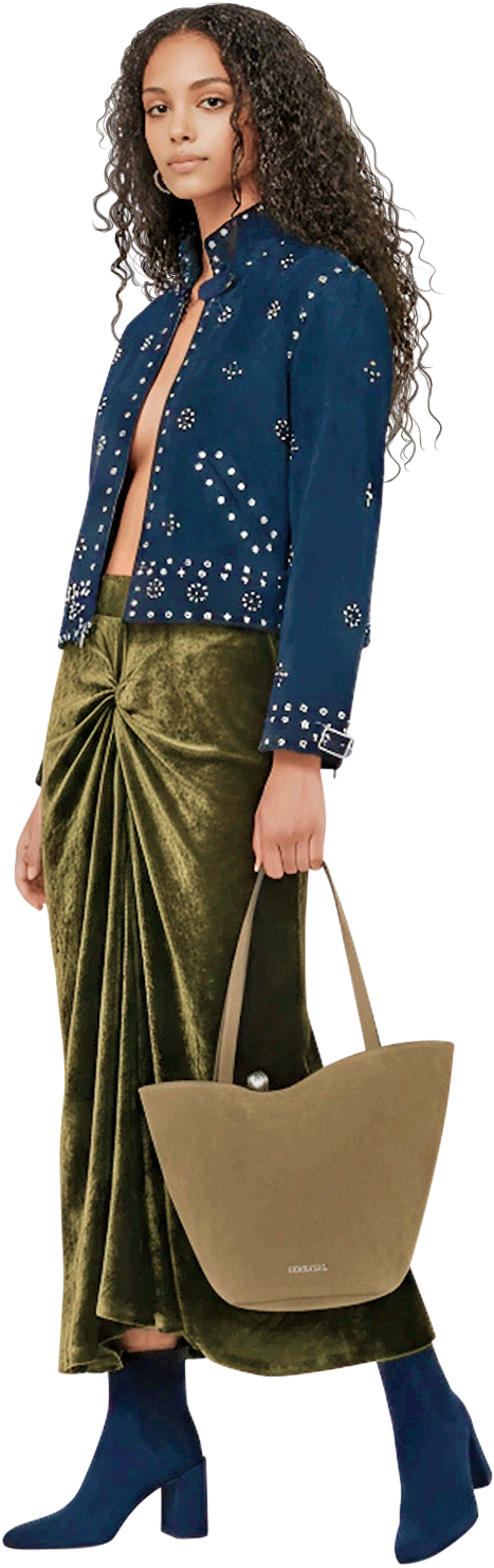 fashion model wearing a stylish outfit with a bag