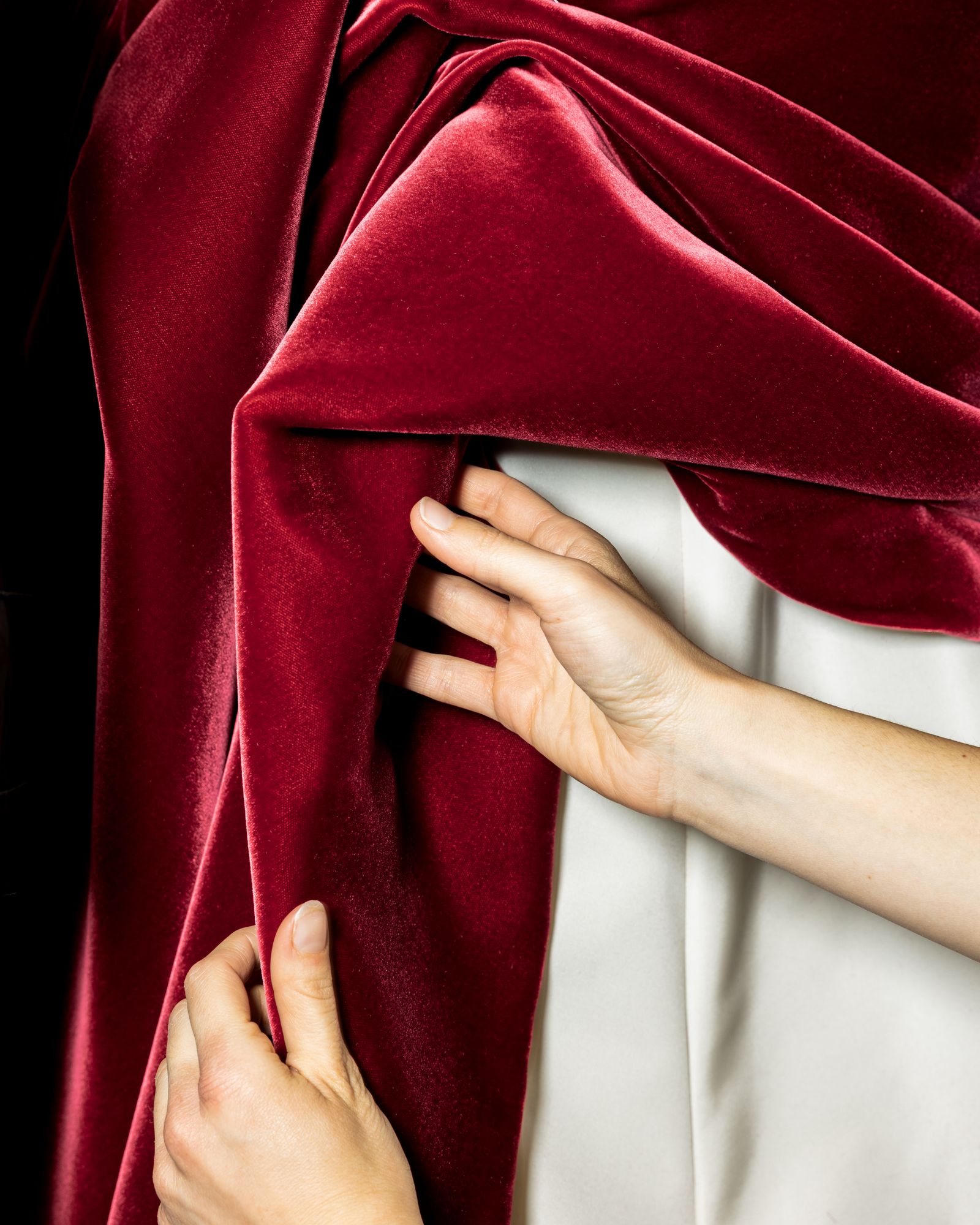 Image may contain Velvet Clothing Coat and Blanket