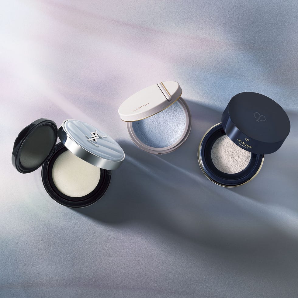 cosmetic compacts with powders in various colors
