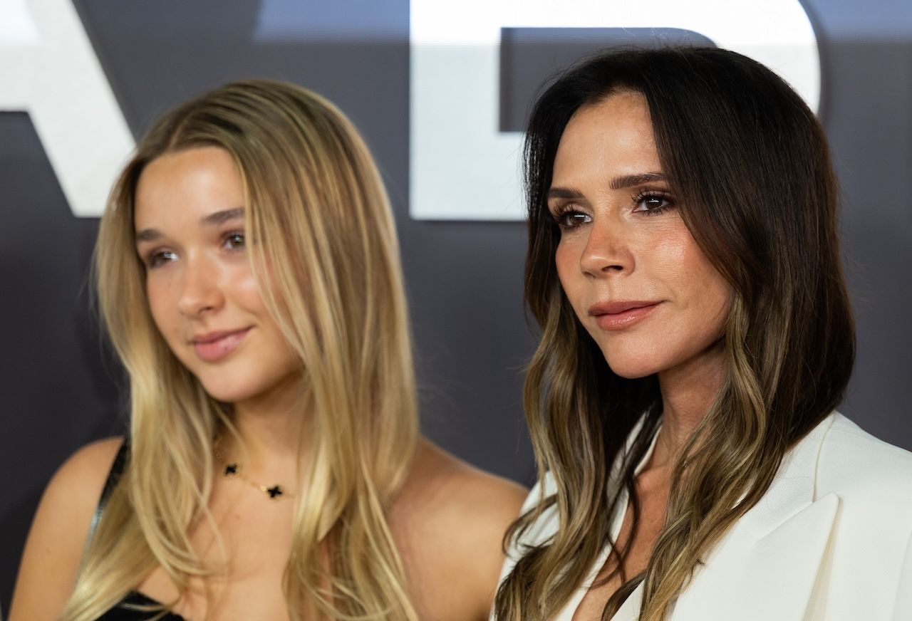 LONDON ENGLAND  OCTOBER 08 Harper Beckham and Victoria Beckham attend the Victoria Beckham World Premiere at the Curzon...