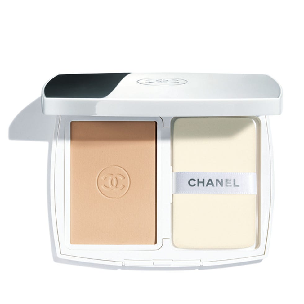 compact powder foundation with a sponge applicator