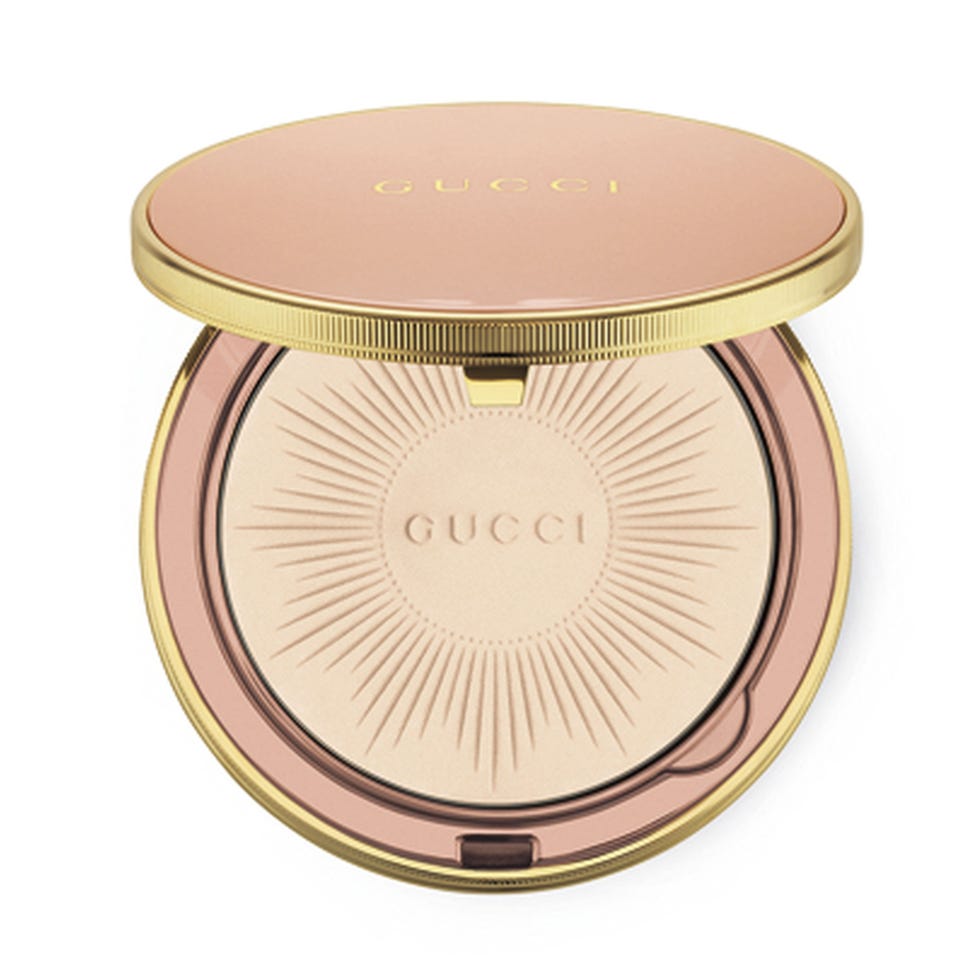 compact powder with an embossed design and branded lid