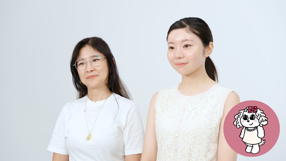 two women standing side by side with an animated character graphic