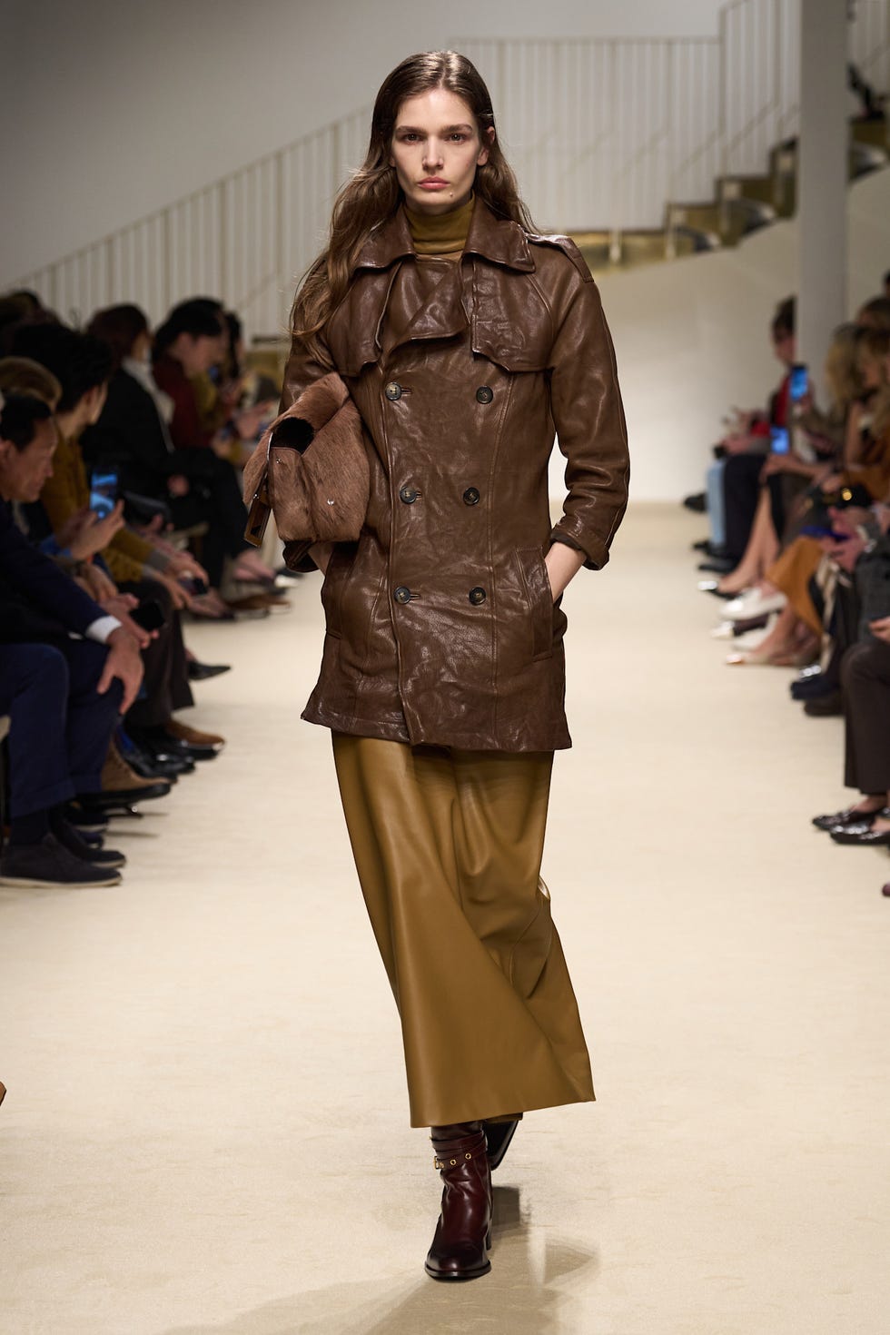 model showcasing a fashion outfit on the runway